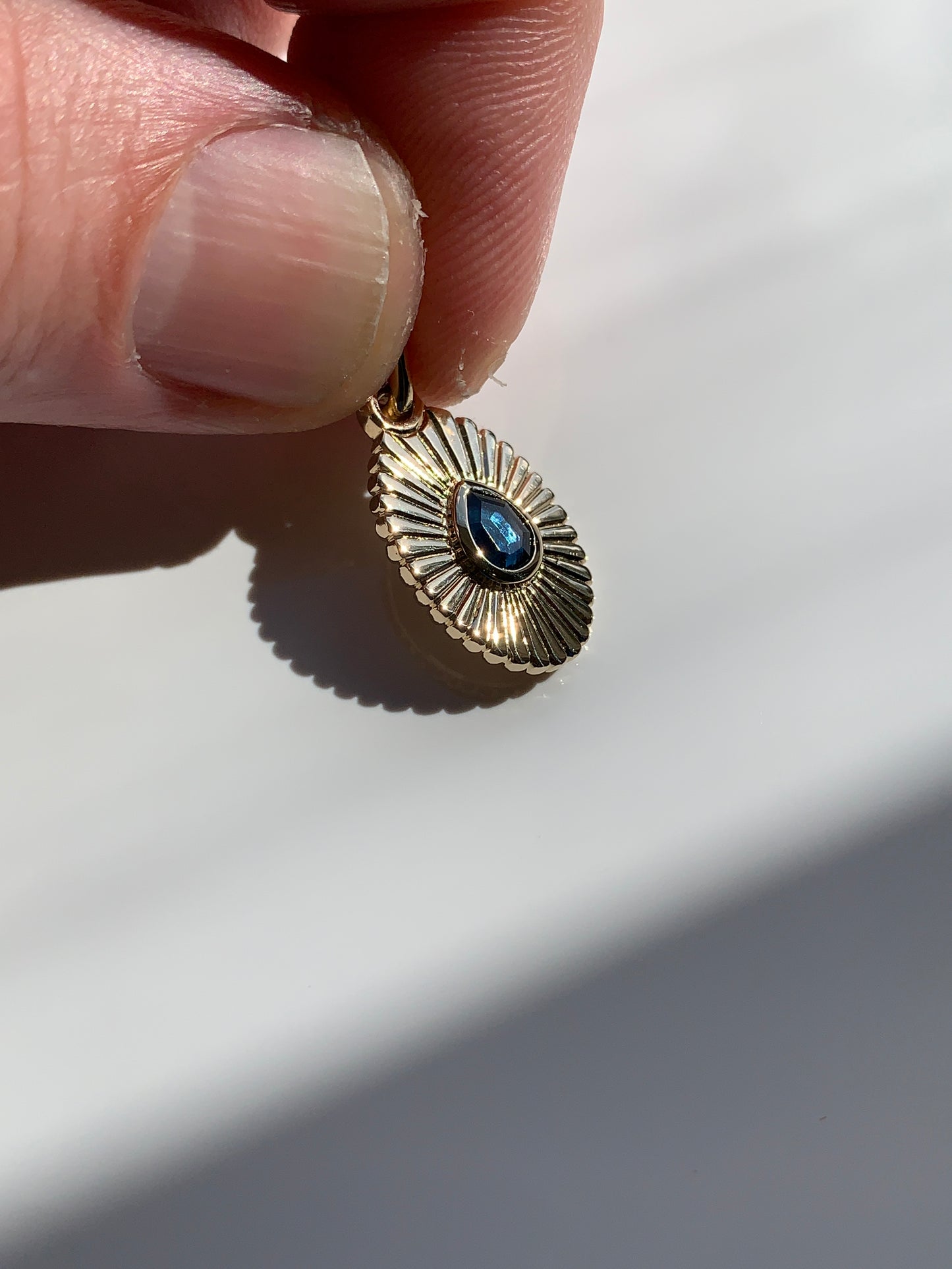 Radiant sapphire charm in 14K Yellow
