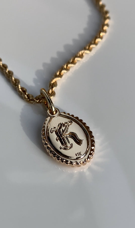 Radiant sapphire charm in 14K Yellow