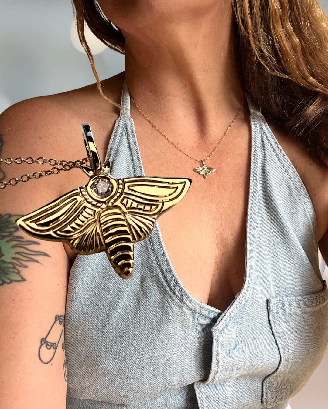 Diamond moth charm