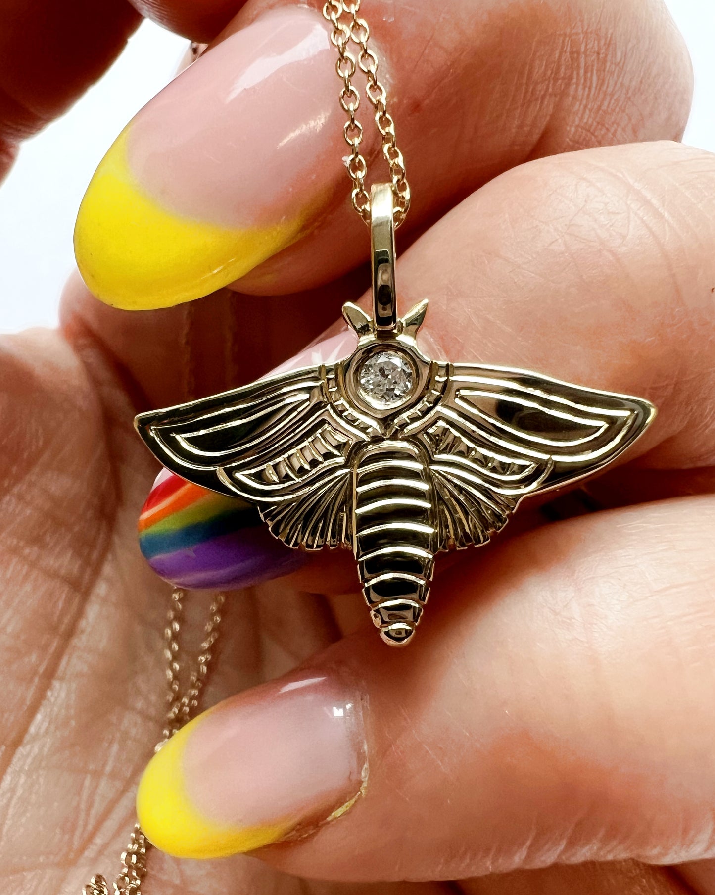 Diamond moth charm