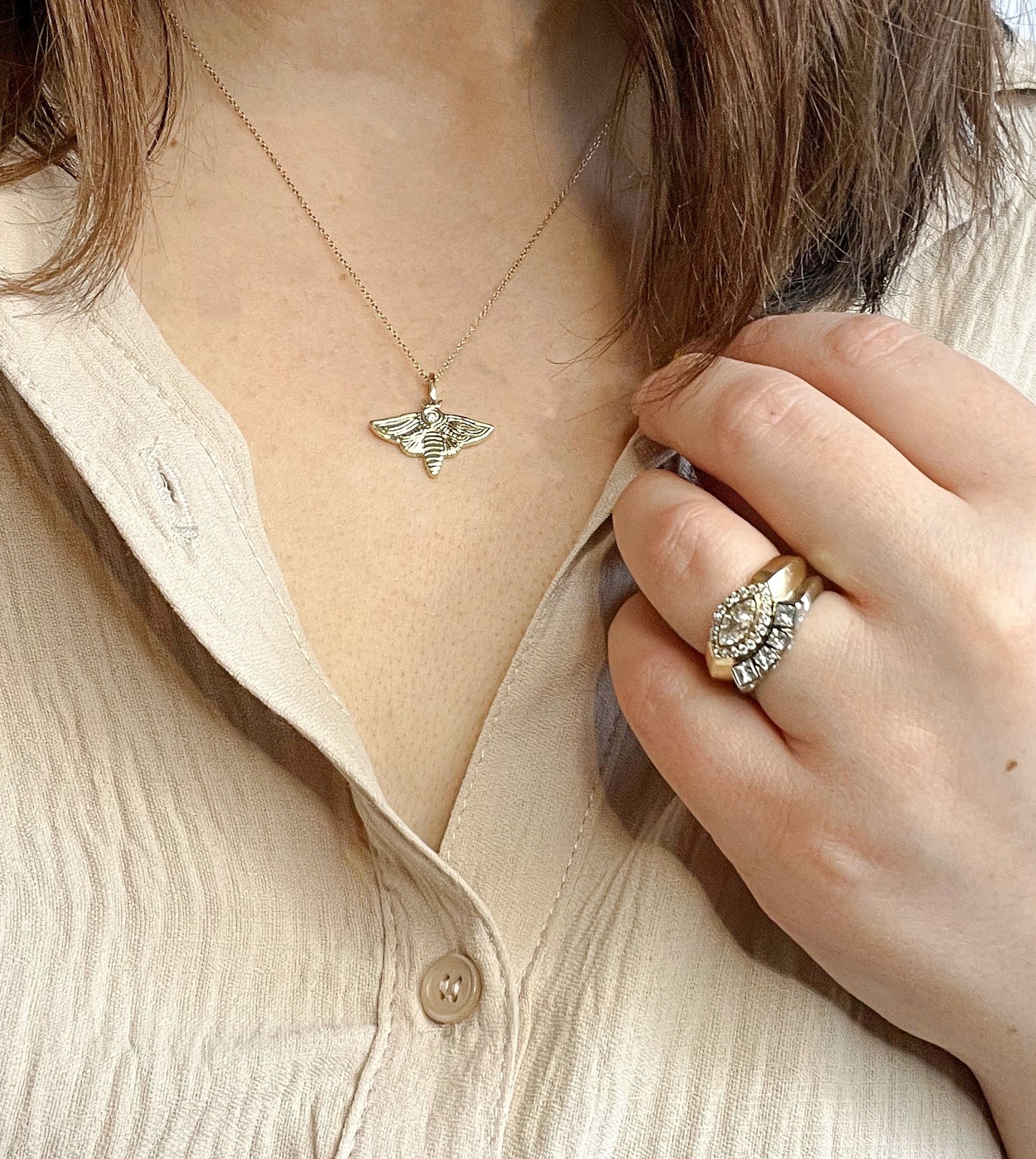 Diamond moth charm