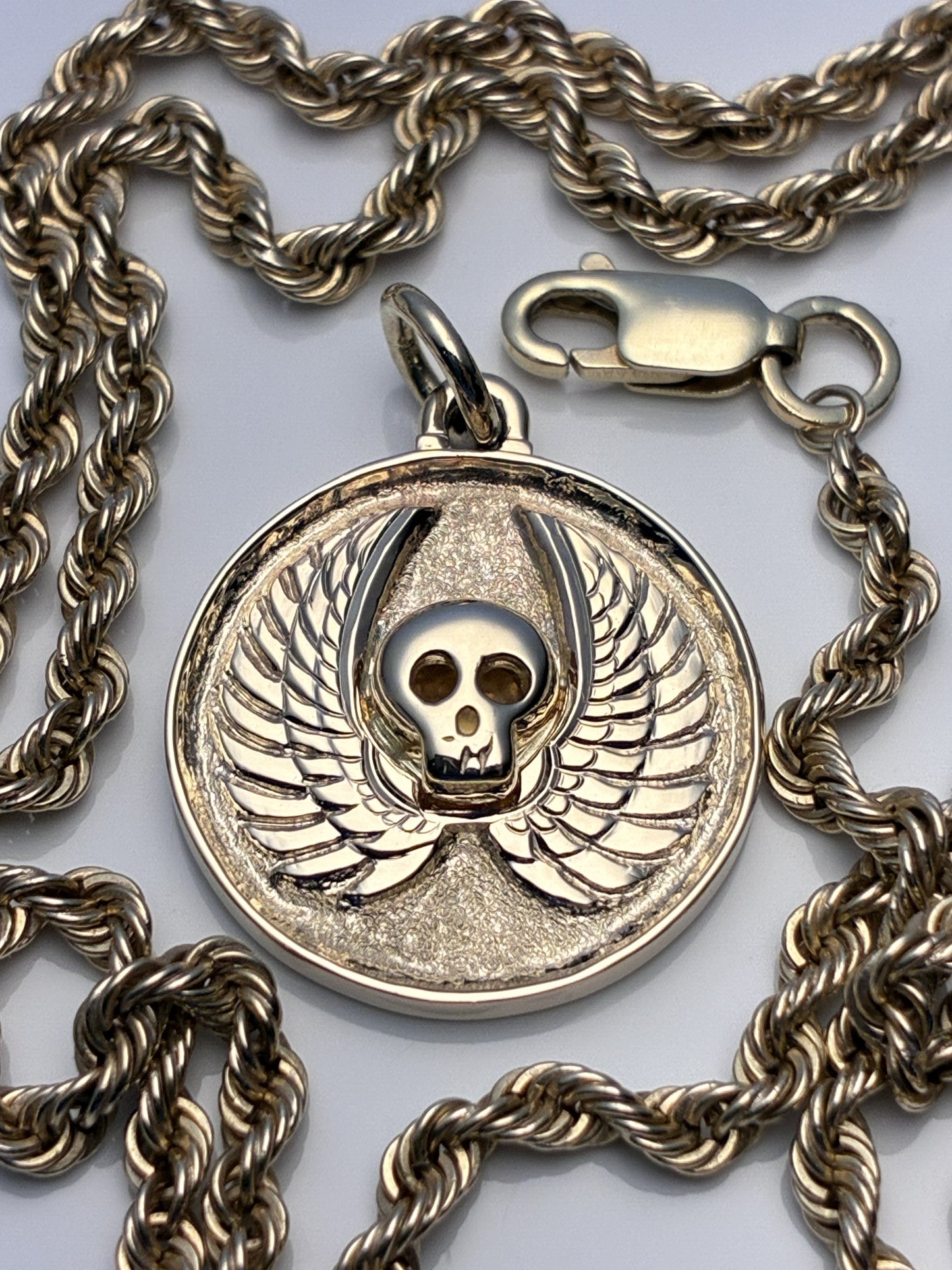 Custom skull & wings pendant