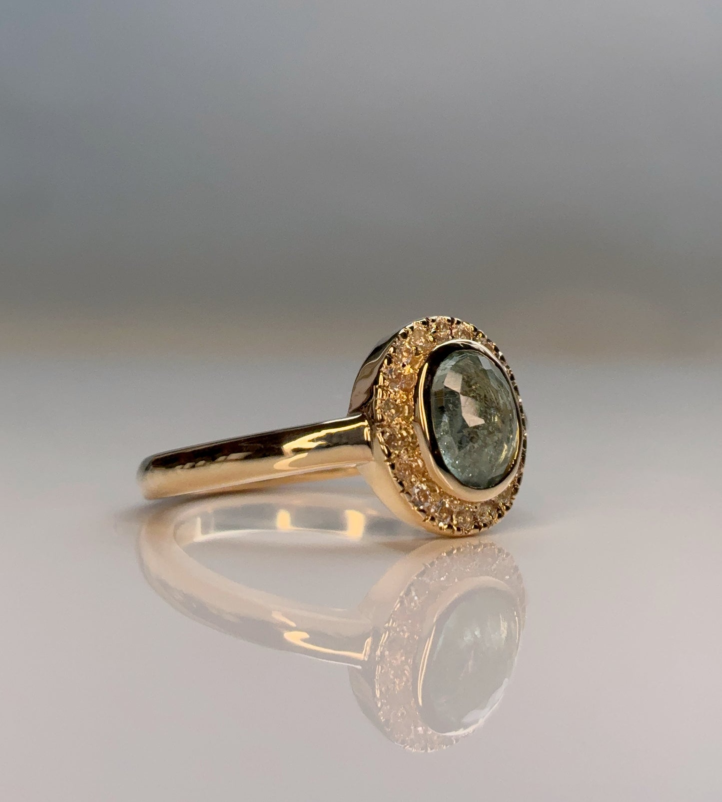 Aquamarine Ring with Sapphire Halo