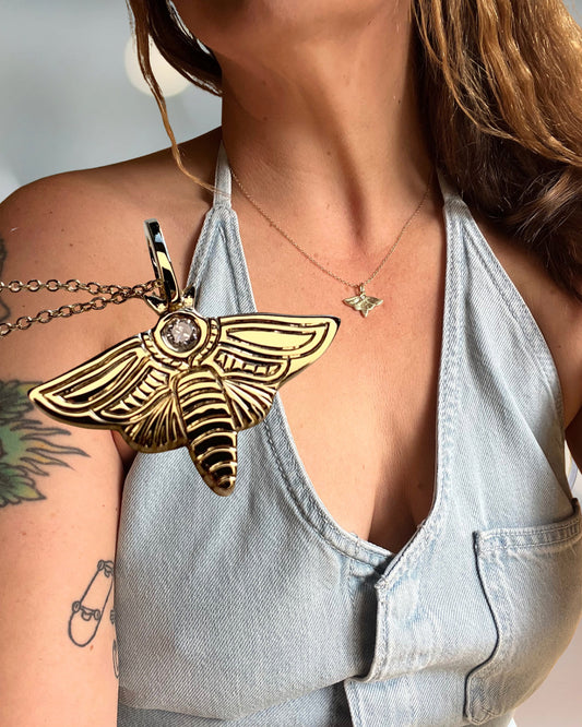 Diamond moth charm