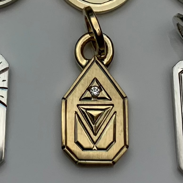 geo diamond charm