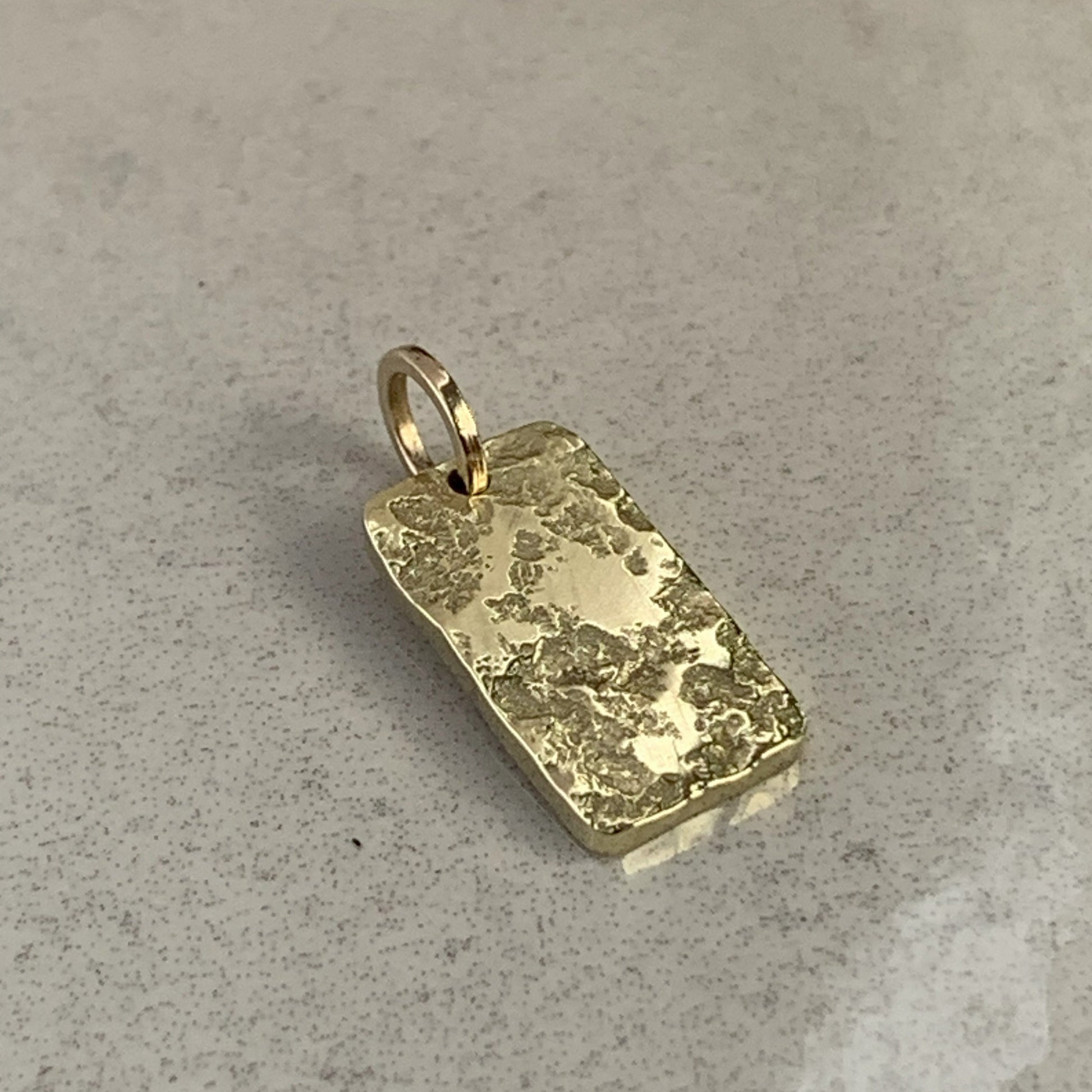 river rock charm