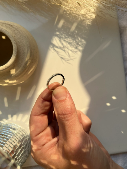 Hand engraved diamond ring